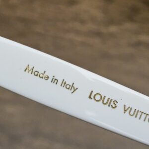 Made in Italy and LOUIS VUITTON printed inside the temple
