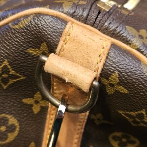 Vachetta strap tab and D ring showing dryness and cracking