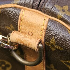 Strap tab stamped 60 with the D ring and strap clip