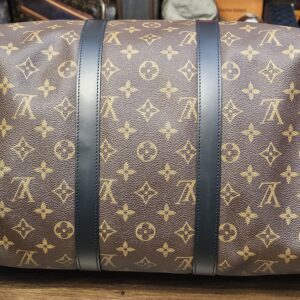 Base of the bag with black leather bands