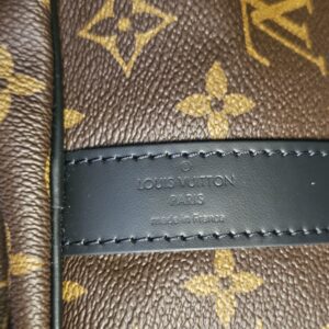 Black leather band with the LOUIS VUITTON PARIS heat stamp