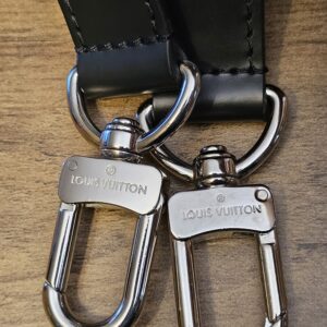 LOUIS VUITTON engraved silver-tone strap clips