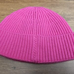 Back of the beanie showing the ribbed knit and folded cuff