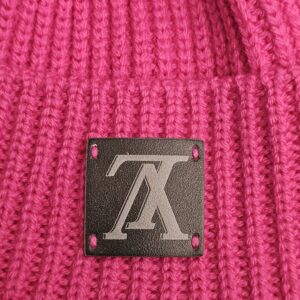 Close up of the upside-down LV logo patch