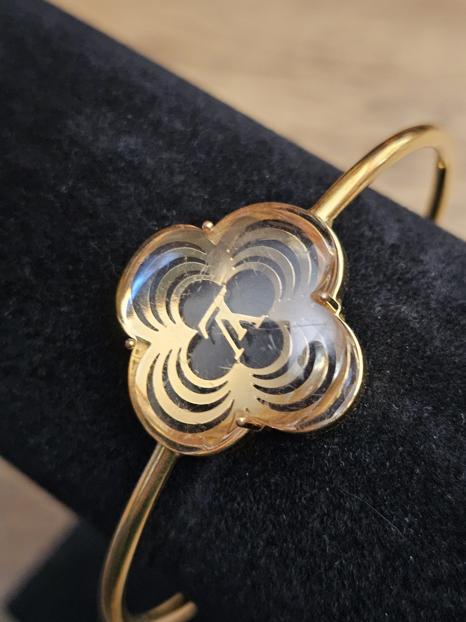 Close up of the resin flower with the LV detailing