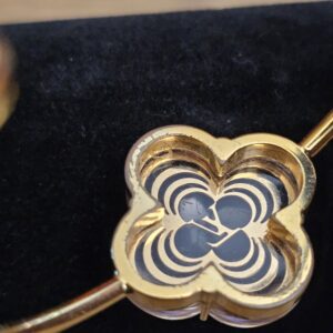 Close up of the flower showing surface scratches in the resin