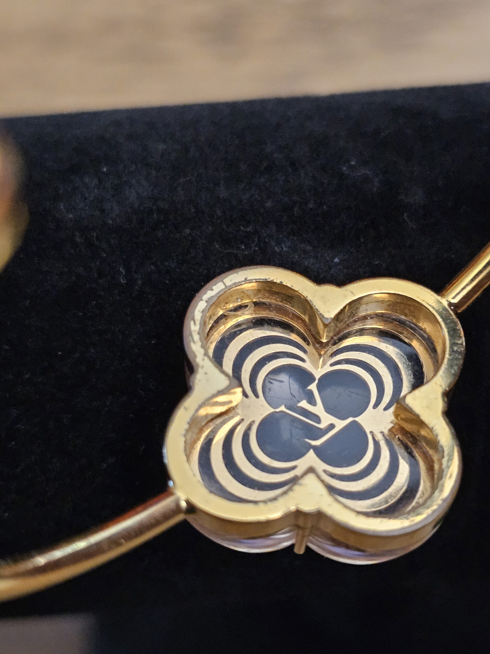 Close up of the flower showing surface scratches in the resin