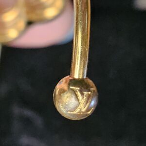 LV engraved ball end showing finish wear