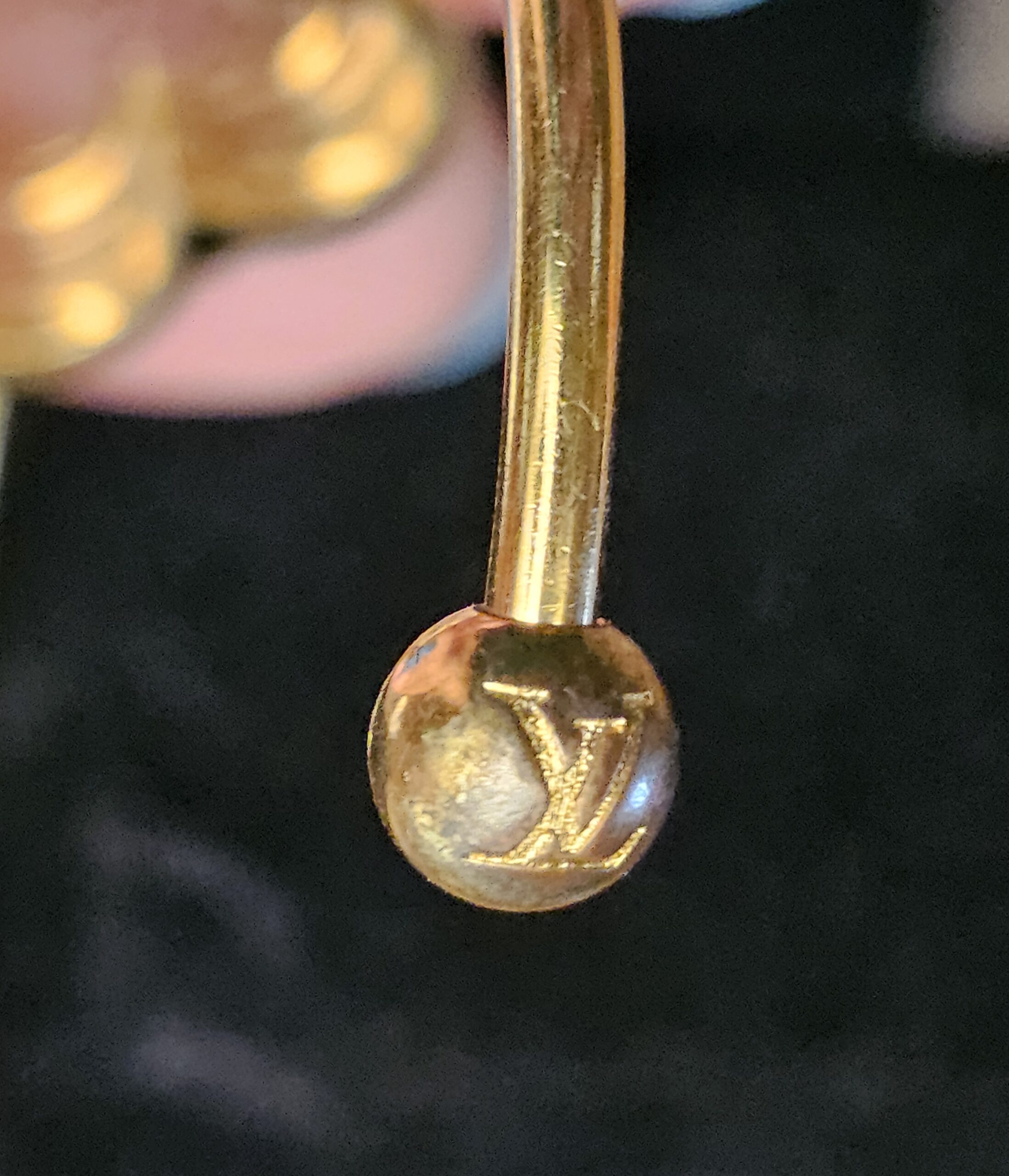 LV engraved ball end showing finish wear