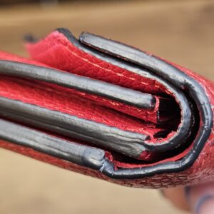 Folded edges showing wear to the edge glazing