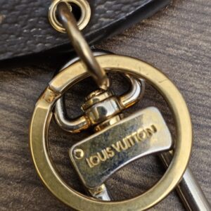 Key ring and clasp showing finish wear