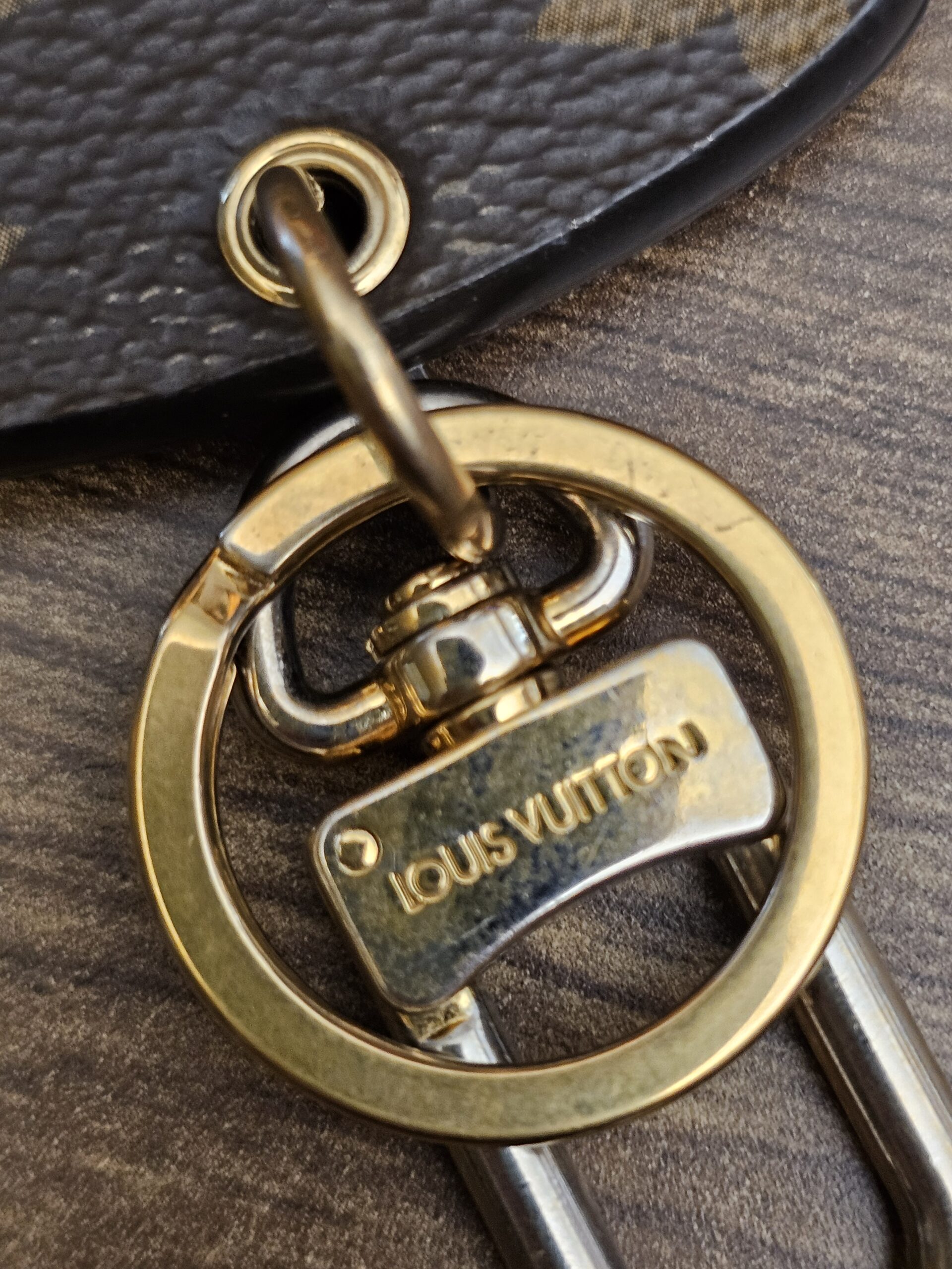 Key ring and clasp showing finish wear