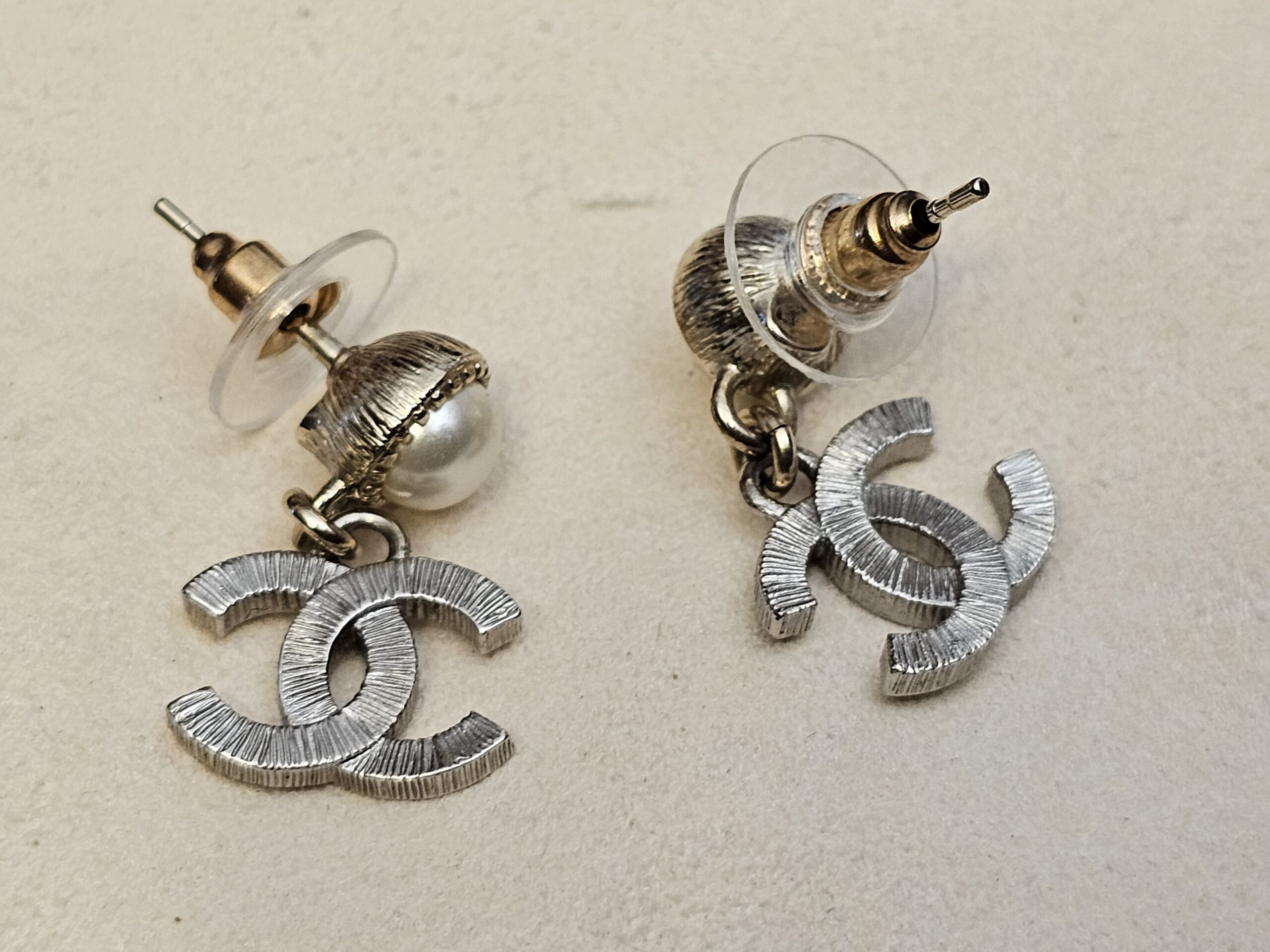 Both earrings from the side with clear post backs