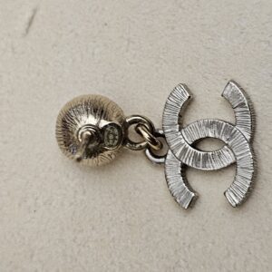 Back of the earring showing the textured CC drop