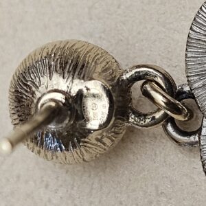 Back of the pearl setting with the post and stamp