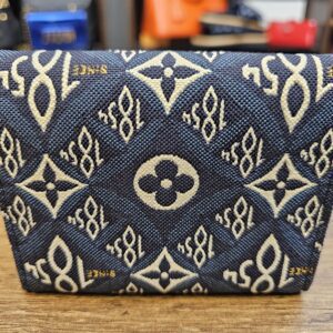 Back of the wallet in navy Since 1854 jacquard