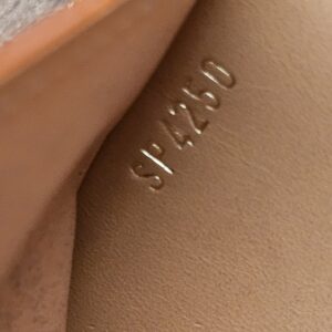 Date code SP4250 heat stamped inside the wallet