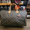 Louis Vuitton Vintage Monogram Speedy 40 - front view with a pink cherry charm on the handle