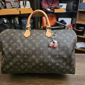 Louis Vuitton Vintage Monogram Speedy 40 - front view with a pink cherry charm on the handle