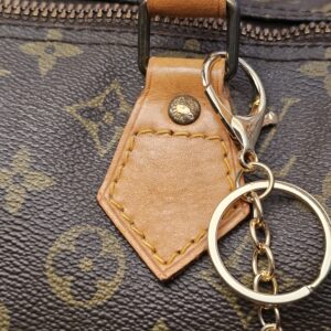 Handle tab with the cherry charm clip attached