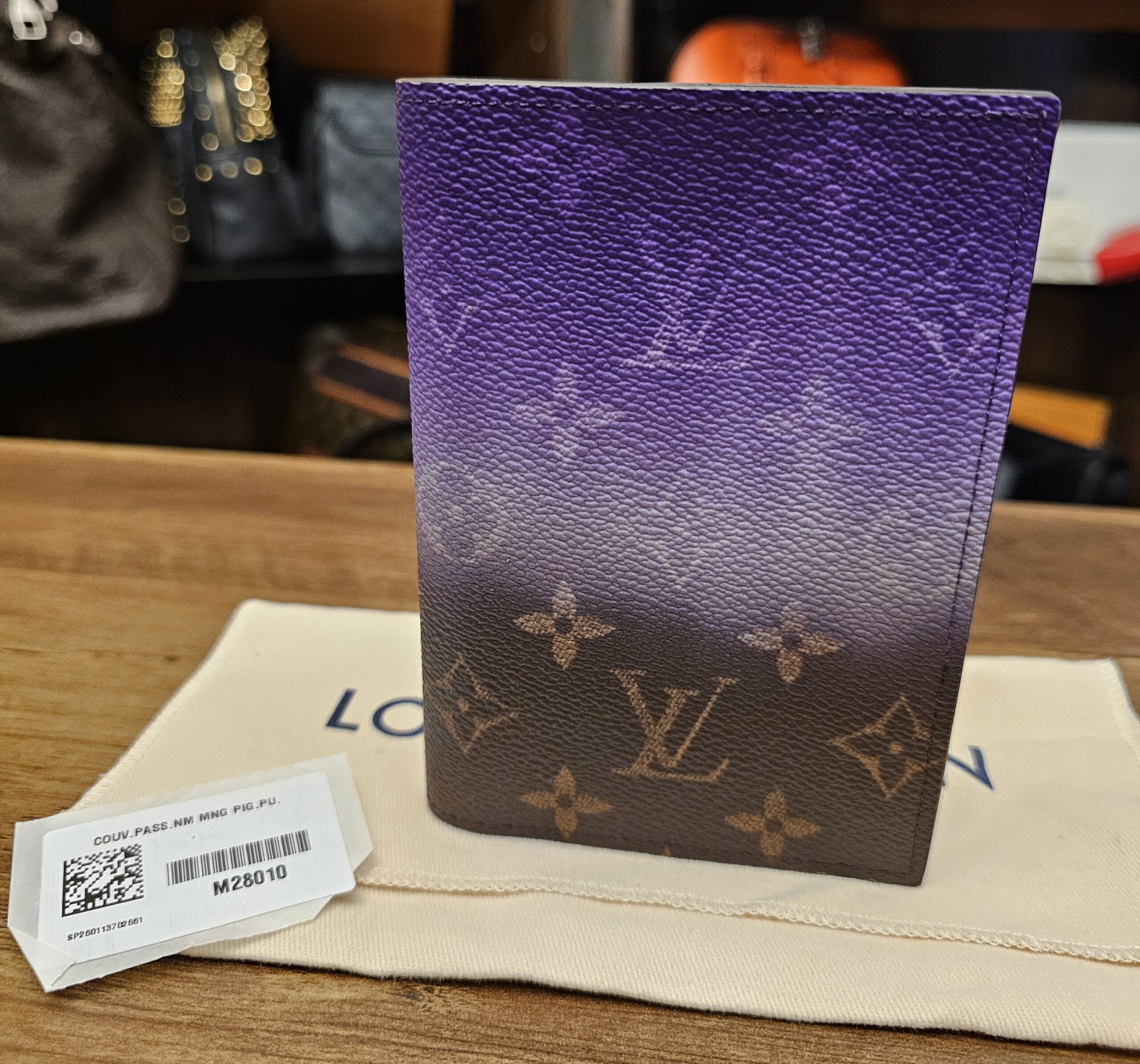 Louis Vuitton Monogram Pigment Passport Cover Purple - front view of the purple gradient over Monogram canvas