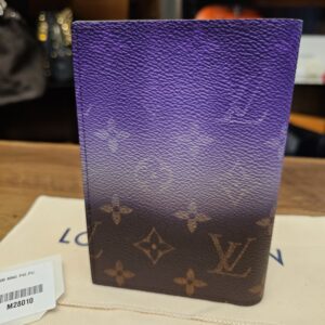 Back of the cover on its dust bag with the retail tag