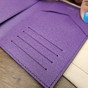 Card slots inside the purple leather interior