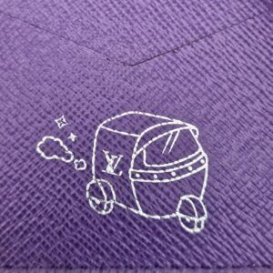Close up of the silver travel illustration inside the cover
