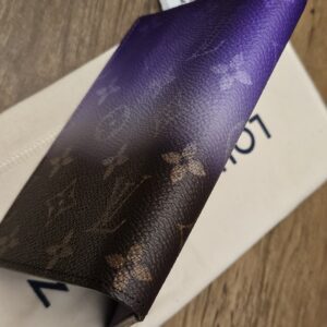 The cover at an angle on its dust bag