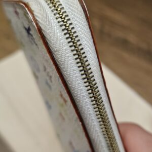 Opposite edge and zipper