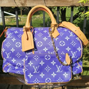 Front of the bag with the matching pouch and name tag