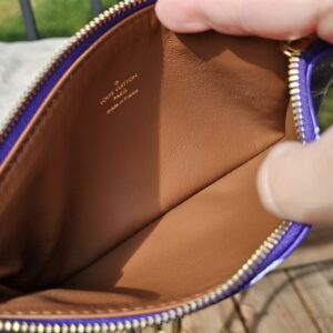 Open pouch showing the brown lining