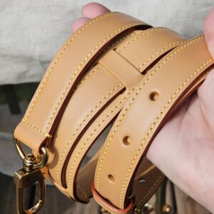 Shoulder strap buckle and holes