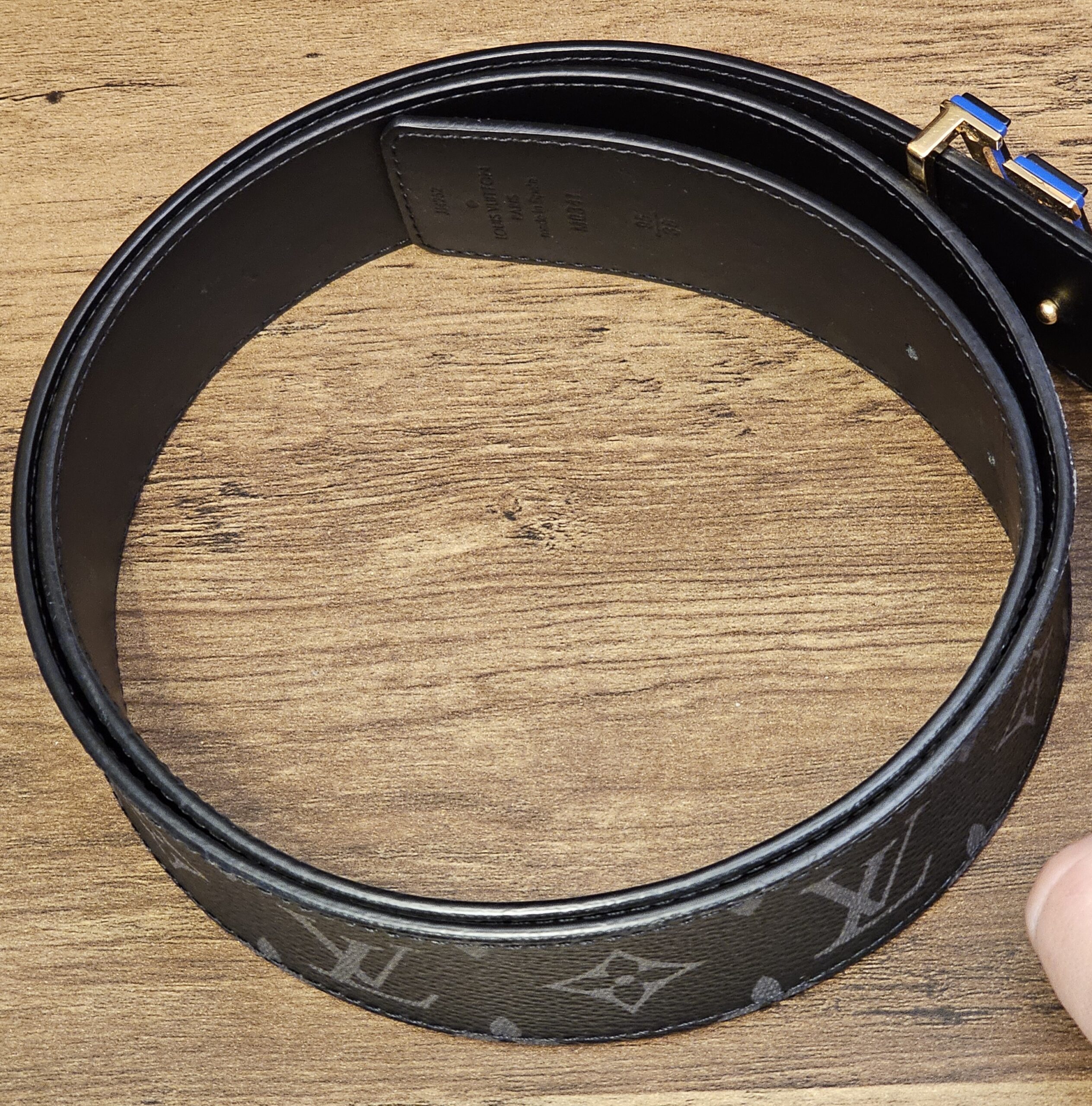 Black leather reverse side, coiled