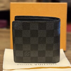 Back of the wallet with the box and dust bag
