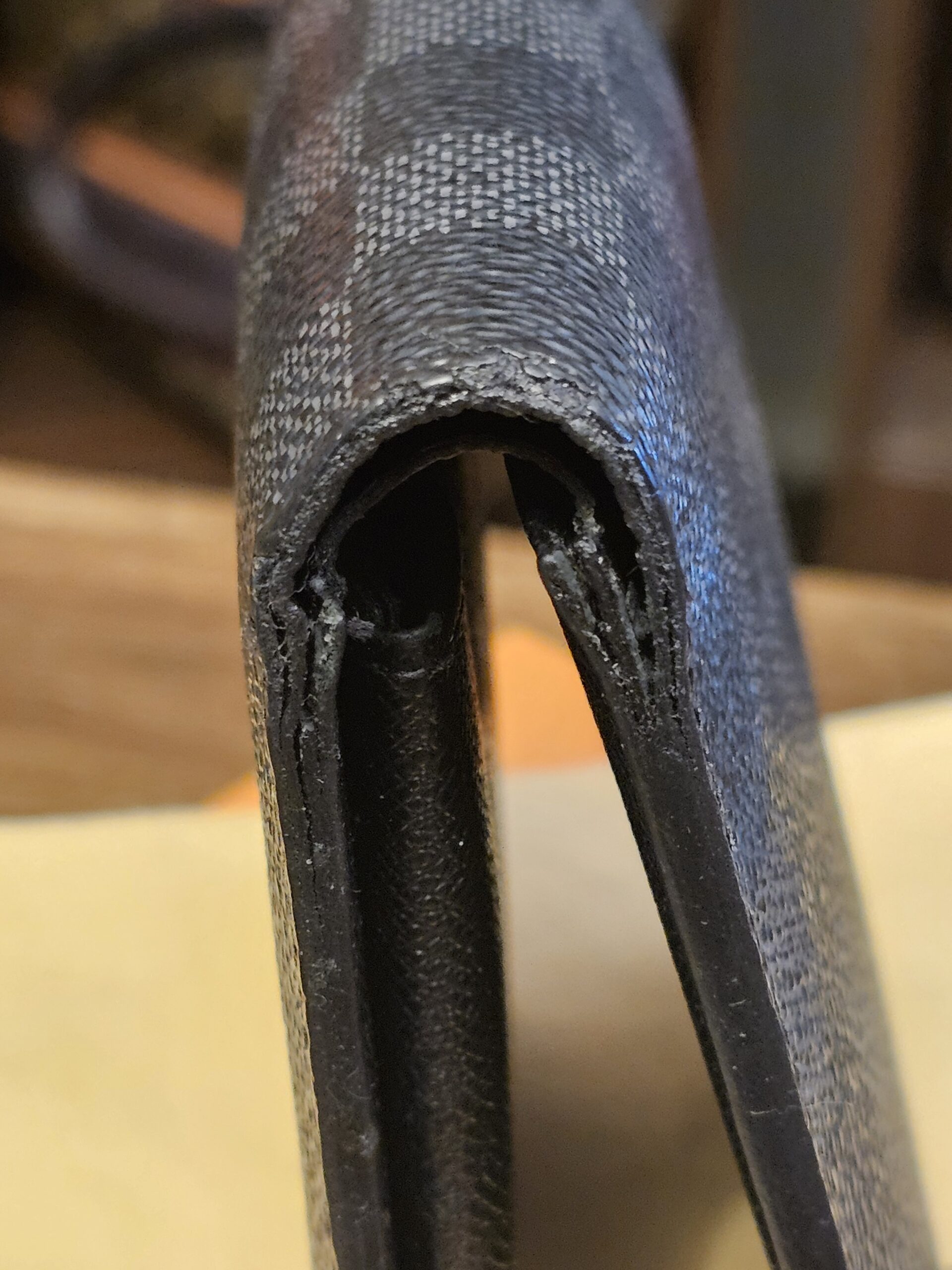 Fold edge close up with cracking