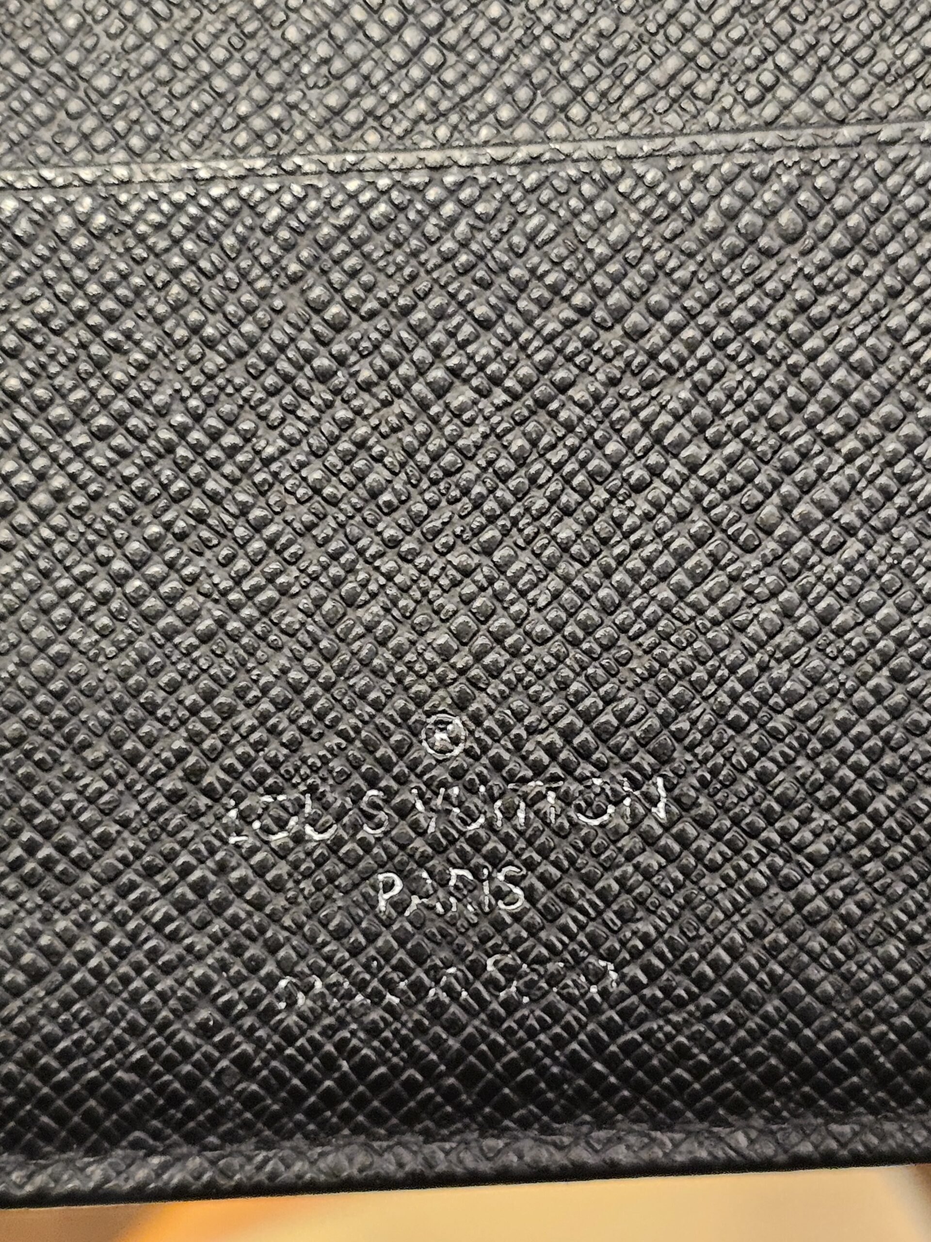 Interior heat stamp on the black leather