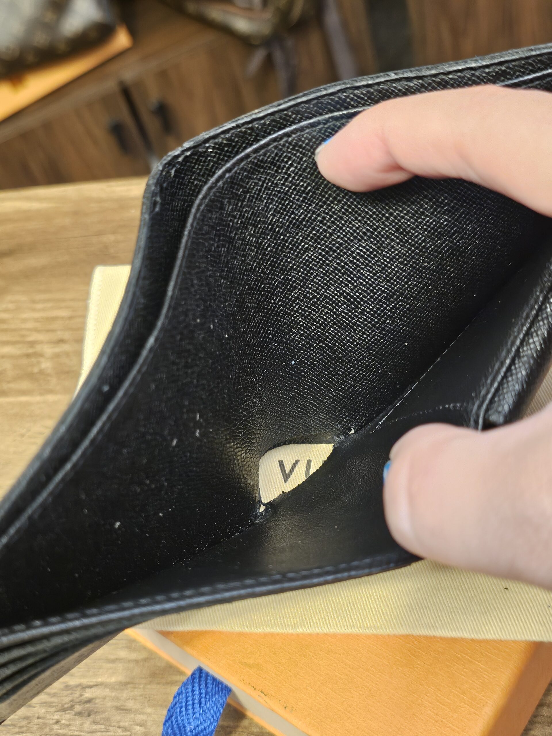 Inside the bill compartment
