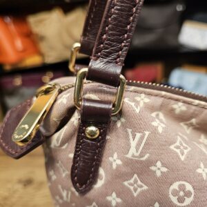 Strap attachment and gold-tone zip pull
