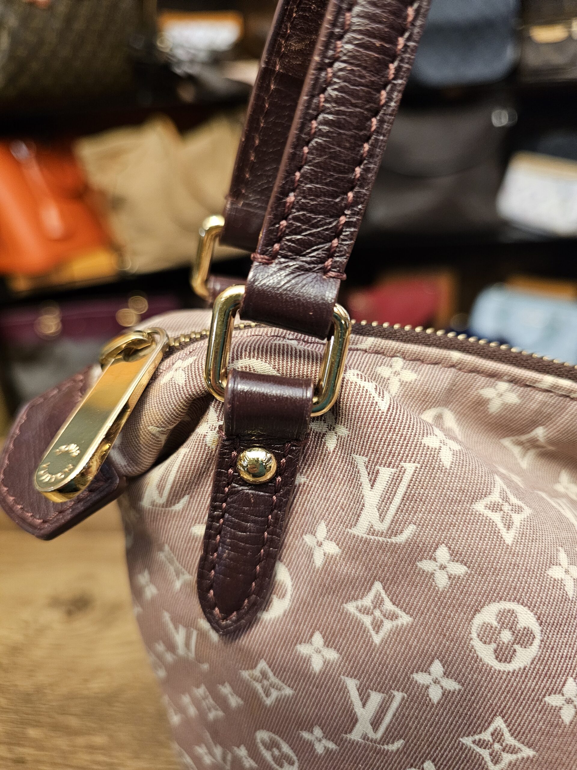 Strap attachment and gold-tone zip pull