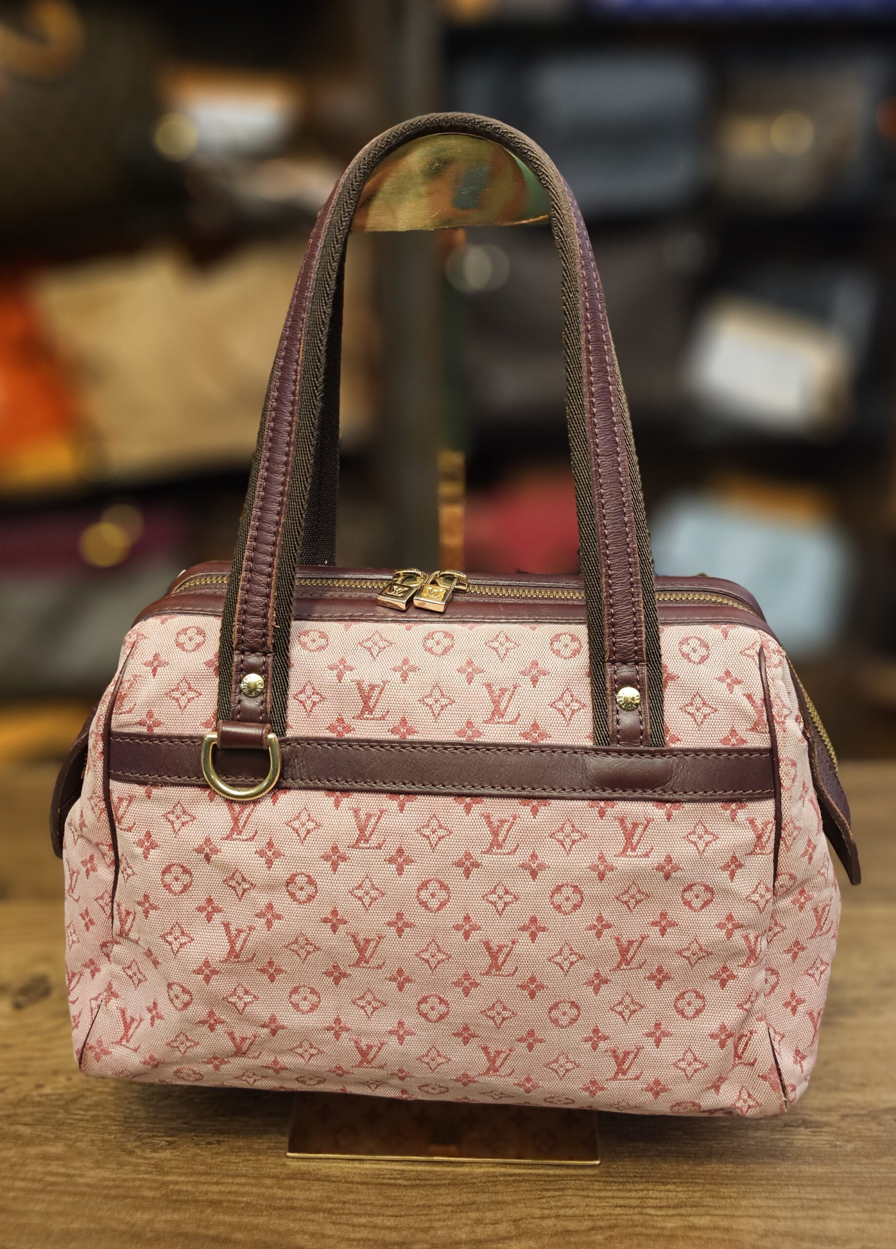 Louis Vuitton Monogram Mini Lin Josephine PM Pink - front view on a stand