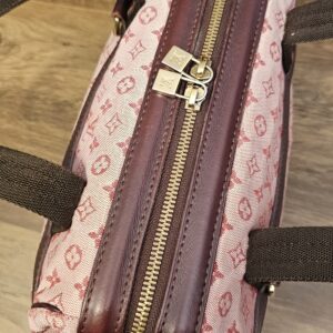Top zip with burgundy leather trim