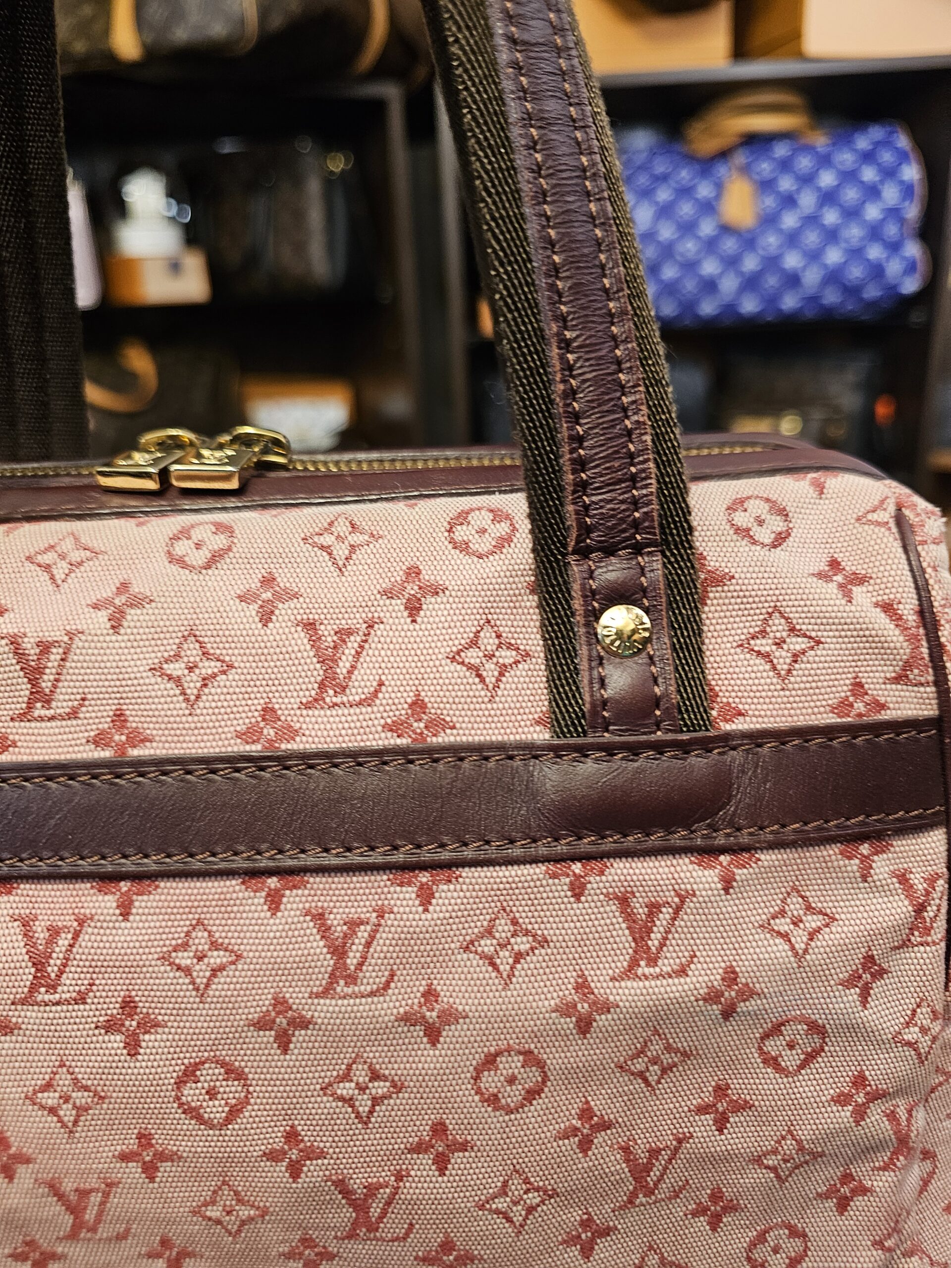 Burgundy trim band and strap tabs on the front