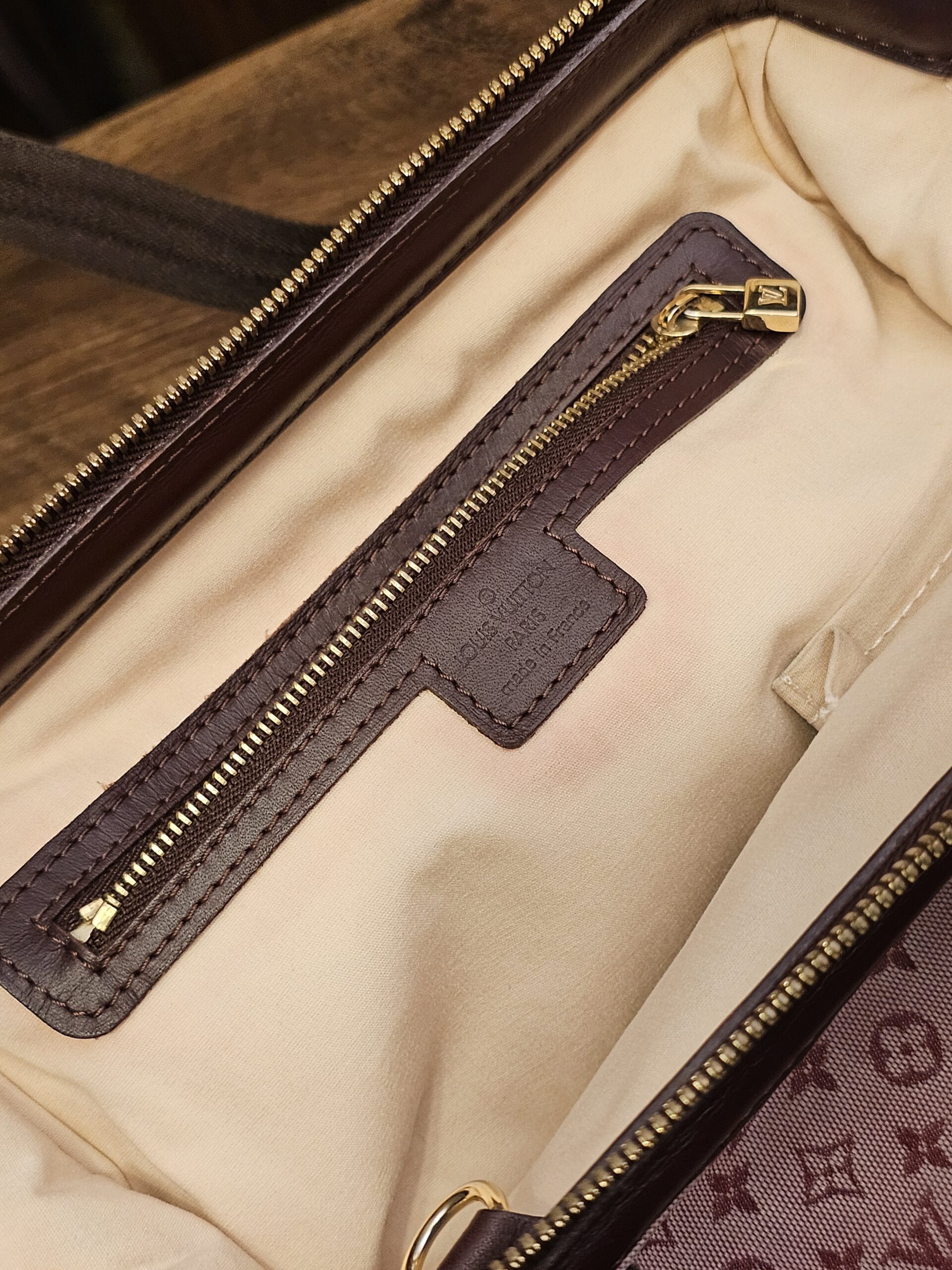 Interior zip pocket and phone pocket