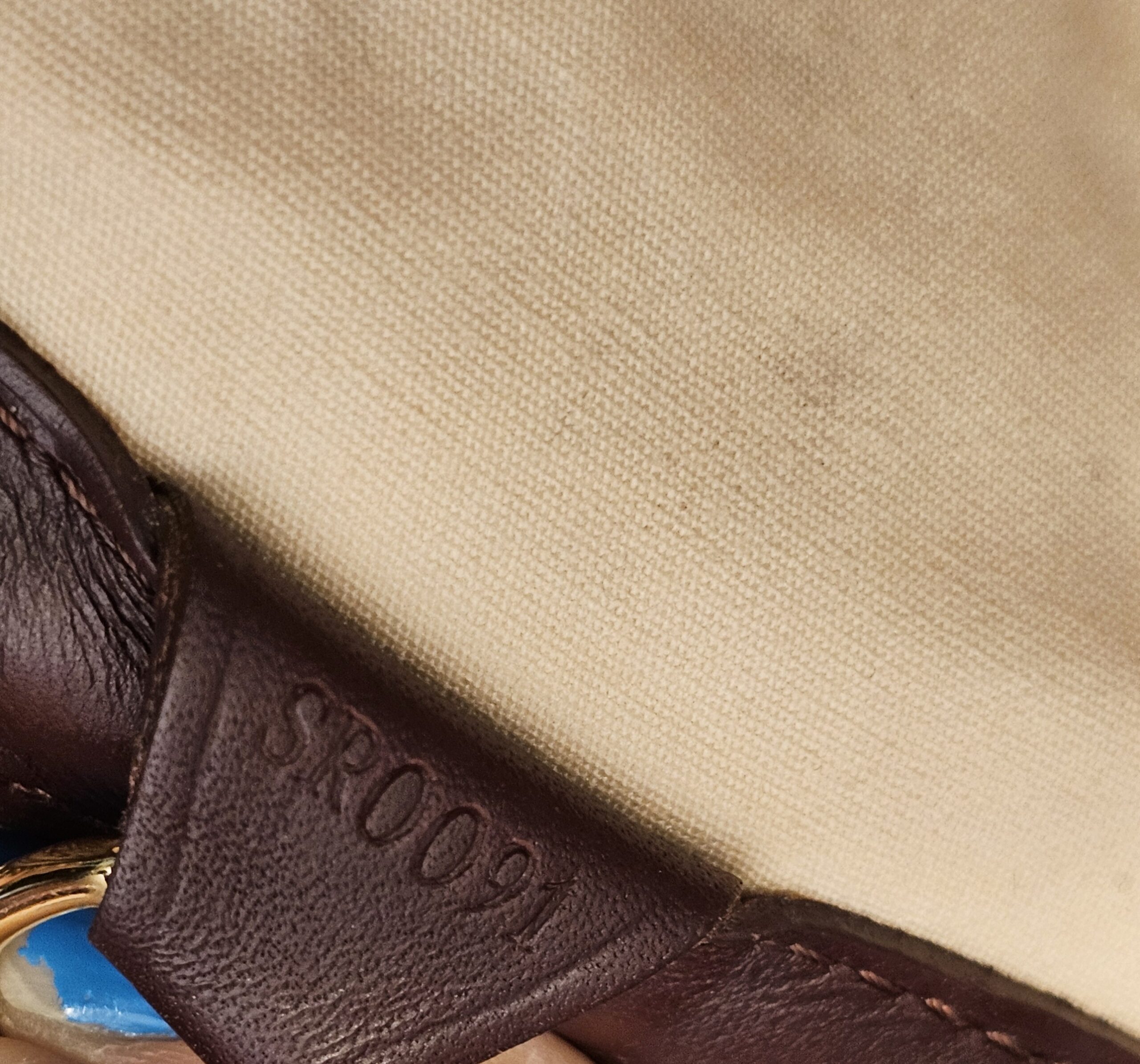 Date code SR0091 stamped on the leather