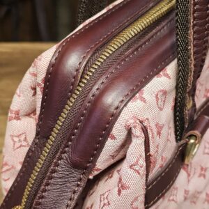 Zip trim and strap base on the side