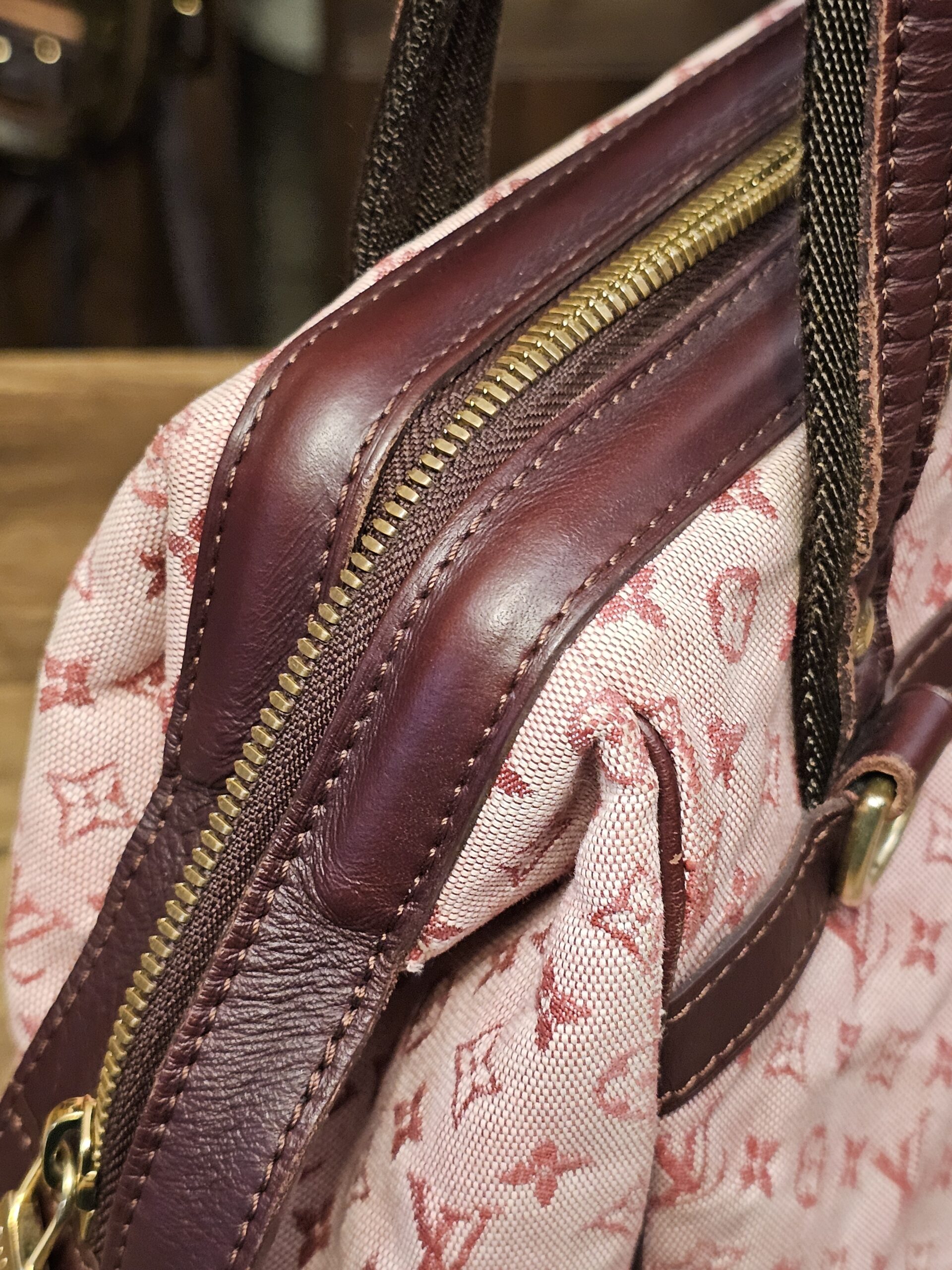 Zip trim and strap base on the side