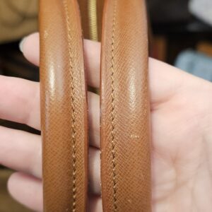 Rolled leather handle held up