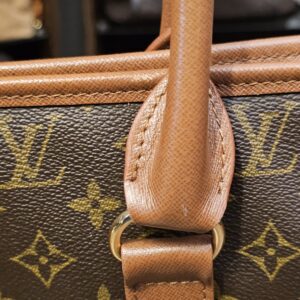 Handle base with light wear to the leather