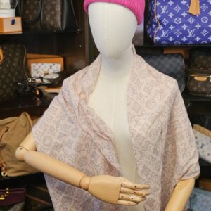 Worn open across the shoulders on a mannequin